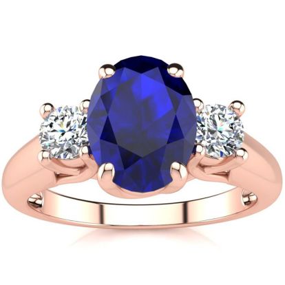 1 3/4 Carat Oval Shape Sapphire and Two Diamond Ring In 14 Karat Rose Gold
