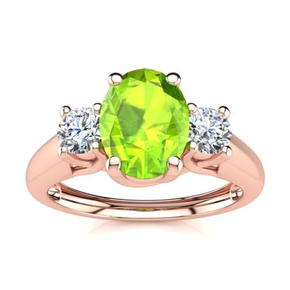 1 Carat Oval Shape Peridot and Two Diamond Ring In 14 Karat Rose Gold
