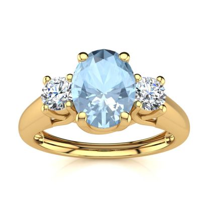 Aquamarine Ring: Aquamarine Jewelry: 1 Carat Oval Shape Aquamarine and Two Diamond Ring In 14 Karat Yellow Gold
