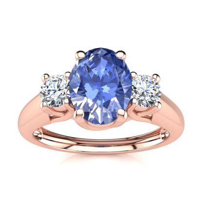 1.15 Carat Oval Shape Tanzanite and Two Diamond Ring In 14 Karat Rose Gold
