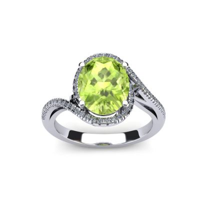 1 1/2 Carat Oval Shape Peridot and Halo Diamond Ring In 14 Karat White Gold