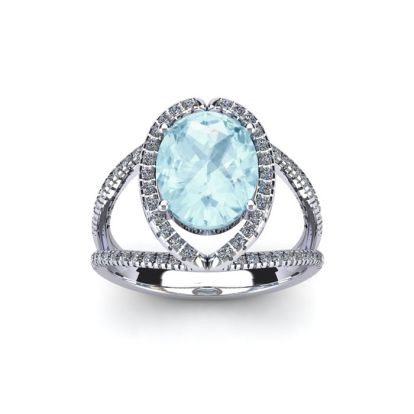 Aquamarine Ring: Aquamarine Jewelry: 1 1/2 Carat Oval Shape Aquamarine and Halo Diamond Ring In 14 Karat White Gold
