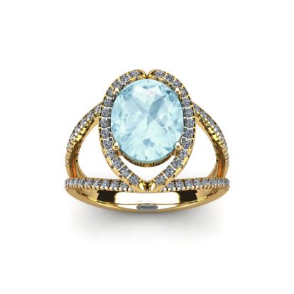 Aquamarine Ring: Aquamarine Jewelry: 1 1/2 Carat Oval Shape Aquamarine and Halo Diamond Ring In 14 Karat Yellow Gold
