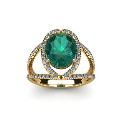 1 1/2 Carat Oval Shape Emerald and Halo Diamond Ring In 14 Karat Yellow Gold
