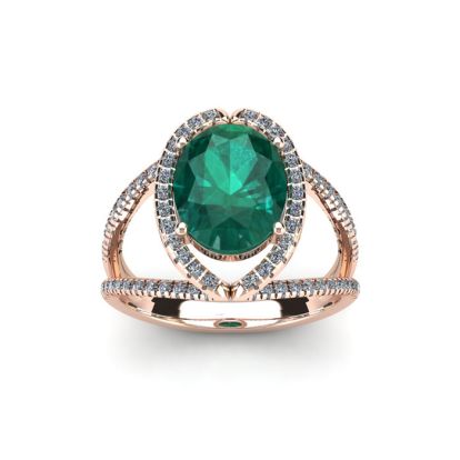 1 1/2 Carat Oval Shape Emerald and Halo Diamond Ring In 14 Karat Rose Gold
