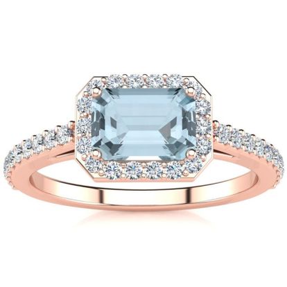 Aquamarine Ring: Aquamarine Jewelry: 1 1/4 Carat Aquamarine and Halo Diamond Ring In 14 Karat Rose Gold