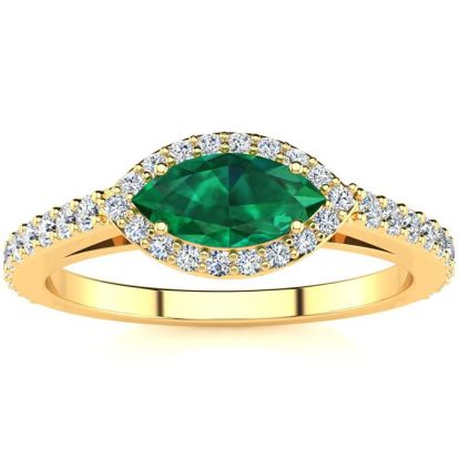 3/4 Carat Marquise Shape Emerald and Halo Diamond Ring In 14 Karat Yellow Gold