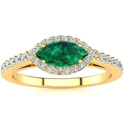 3/4 Carat Marquise Shape Emerald and Halo Diamond Ring In 14 Karat Yellow Gold