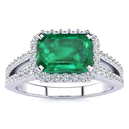 1 1/3 Carat Antique Emerald and Halo Diamond Ring In 14 Karat White Gold