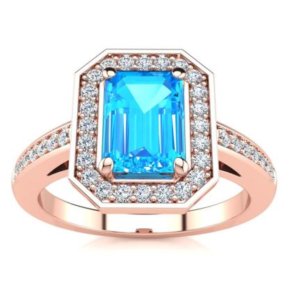 1 1/2 Carat Blue Topaz and Halo Diamond Ring In 14 Karat Rose Gold