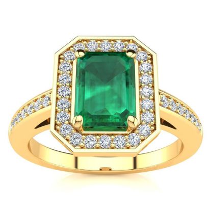 1 Carat Emerald and Halo Diamond Ring In 14 Karat Yellow Gold