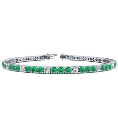 5 2/3 Carat Emerald And Diamond Graduated Tennis Bracelet In 14 Karat White Gold, 9 Inches