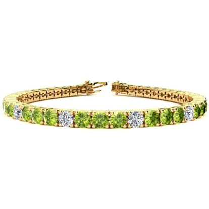 9 1/5 Carat Peridot and Diamond Alternating Tennis Bracelet In 14 Karat Yellow Gold, 7 Inches
