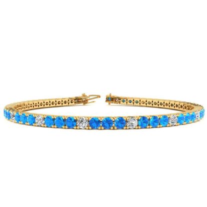 5 Carat Blue Topaz And Diamond Alternating Tennis Bracelet In 14 Karat Yellow Gold, 7 Inches
