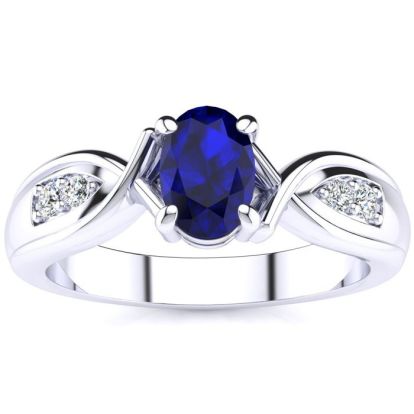 1 Carat Oval Shape Sapphire and Four Diamond Ring In 10 Karat White Gold