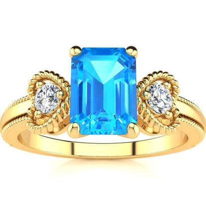 1 1/3 Carat Blue Topaz and Two Diamond Heart Ring In 10 Karat Yellow Gold