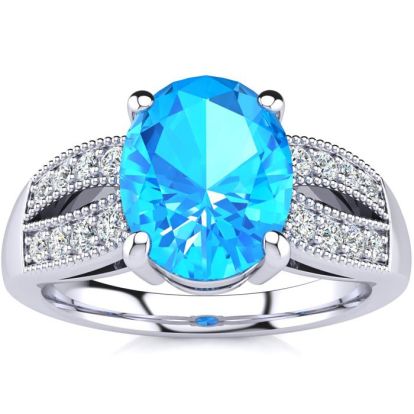 2 1/3 Carat Oval Shape Blue Topaz and Diamond Ring In 14 Karat White Gold