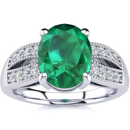 2 Carat Oval Shape Emerald and Diamond Ring In 14 Karat White Gold