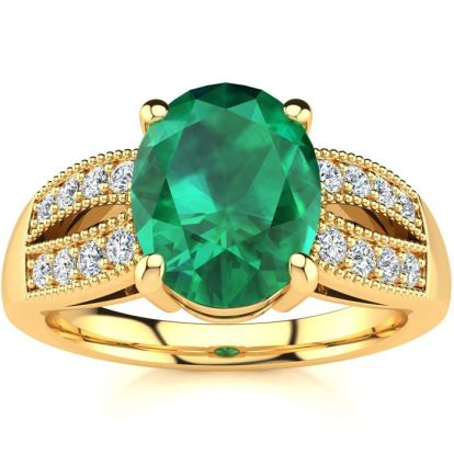 2 Carat Oval Shape Emerald and Diamond Ring In 14 Karat Yellow Gold