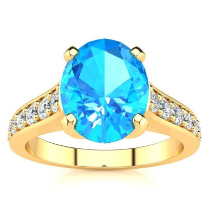 2 1/2 Carat Oval Shape Blue Topaz and Diamond Ring In 14 Karat Yellow Gold