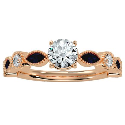 1 1/4 Carat Round and Marquise Vintage Diamond and Sapphire Engagement Ring In 14 Karat Rose Gold