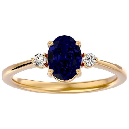 1 3/4 Carat Oval Shape Sapphire and Two Diamond Ring In 14 Karat Yellow Gold