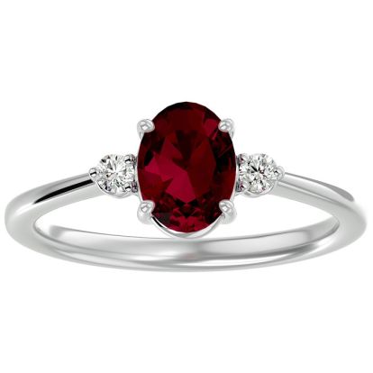 1.65 Carat Oval Shape Ruby and Two Diamond Ring In 14 Karat White Gold