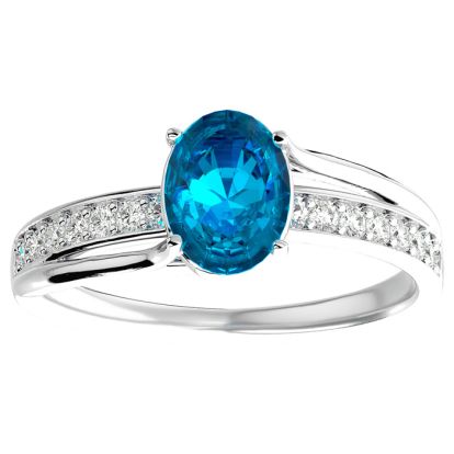 1 3/4 Carat Oval Shape Blue Topaz and Diamond Ring In 14 Karat White Gold