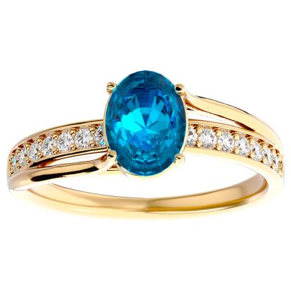1 3/4 Carat Oval Shape Blue Topaz and Diamond Ring In 14 Karat Yellow Gold