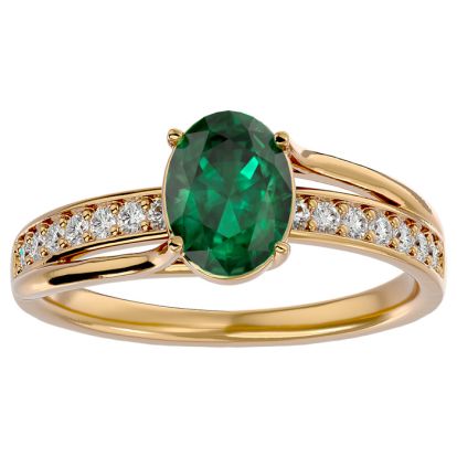 1 1/3 Carat Oval Shape Emerald and Diamond Ring In 14 Karat Yellow Gold