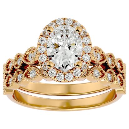 1 1/2 Carat Oval Shape Diamond Bridal Set In 14 Karat Yellow Gold
