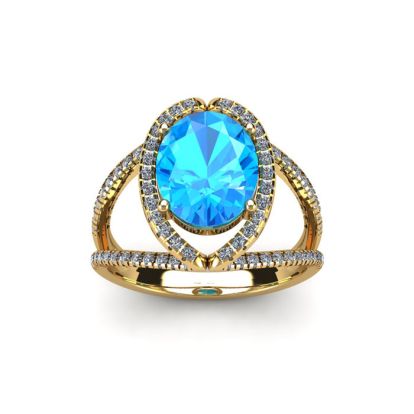2 Carat Oval Shape Blue Topaz and Halo Diamond Ring In 14 Karat Yellow Gold