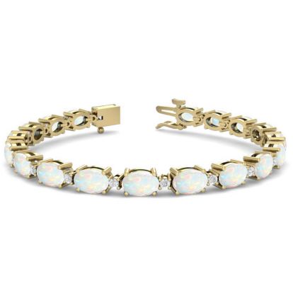 Opal Bracelet With 6 Carats of Oval Shape Opals and Diamonds In 14 Karat Yellow Gold, 7 Inches
