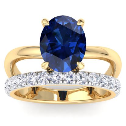 3.60 Carat Oval Shape Sapphire and Halo Diamond Ring Plus Band In 14 Karat Yellow Gold