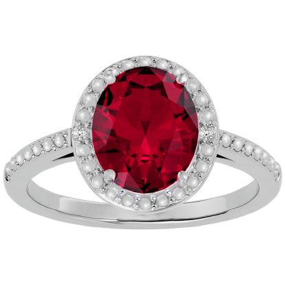 3 ½ Carat Ruby and Diamond Halo Ring created in platinum overlay
