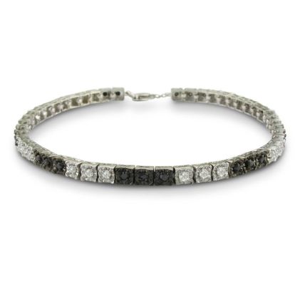 Sterling silver black diamond tennis bracelet with 50 alternating black and white diamonds.  Diamond content is 1 carat in  J/K color I2 clarity.