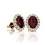 Garnet Earrings: Garnet Jewelry: 1 1/4 Carat Oval Shape Garnet and Halo Diamond Stud Earrings In 14 Karat Yellow Gold Image-1
