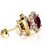 1 1/4 Carat Oval Shape Ruby and Halo Diamond Stud Earrings In 14 Karat Yellow Gold Image-2