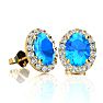 2 1/4 Carat Oval Shape Blue Topaz and Halo Diamond Stud Earrings In 14 Karat Yellow Gold Image-1