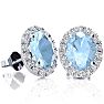 Aquamarine Earrings: Aquamarine Jewelry: 2 1/2 Carat Oval Shape Aquamarine and Halo Diamond Stud Earrings In 14 Karat White Gold Image-1