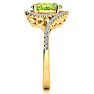 2 3/4 Carat Oval Shape Peridot and Halo Diamond Ring In 14 Karat Yellow Gold Image-4