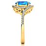 3 1/2 Carat Oval Shape Blue Topaz and Halo Diamond Ring In 14 Karat Yellow Gold Image-4