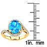 3 1/2 Carat Oval Shape Blue Topaz and Halo Diamond Ring In 14 Karat Yellow Gold Image-5