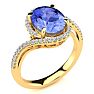 2 3/4 Carat Oval Shape Tanzanite and Halo Diamond Ring In 14 Karat Yellow Gold Image-2