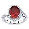 3 1/3 Carat Oval Shape Ruby and Halo Diamond Ring In 14 Karat White Gold Image-1