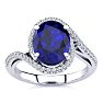 3 1/3 Carat Oval Shape Sapphire and Halo Diamond Ring In 14 Karat White Gold Image-1