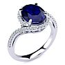 3 1/3 Carat Oval Shape Sapphire and Halo Diamond Ring In 14 Karat White Gold Image-2