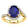 3 1/3 Carat Oval Shape Sapphire and Halo Diamond Ring In 14 Karat Yellow Gold Image-1