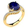 3 1/3 Carat Oval Shape Sapphire and Halo Diamond Ring In 14 Karat Yellow Gold Image-2
