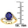 3 1/3 Carat Oval Shape Sapphire and Halo Diamond Ring In 14 Karat Yellow Gold Image-5